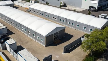 Bird's eye view of the north side of the residential complex with two lightweight halls