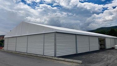 Rear of a tent hall with trapezoidal sheet metal façade
