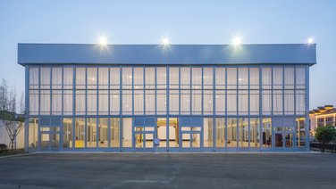 Rear of the Wuzhen Art Gallery tent hall with glass façade