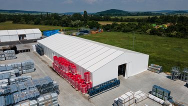 Bird's-eye_view_storage_tent_with_PVC_canvas_roof_and_PVC_canvas_façade