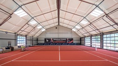 Interior view of the court of an indoor tennis hall