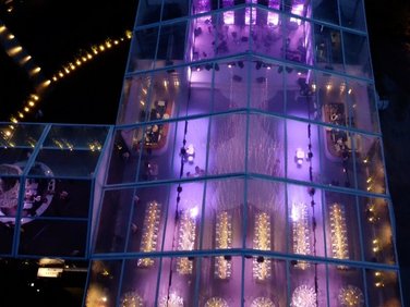 Large tent with transparent roof - bird's eye view with event lighting