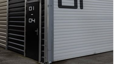 View of a personnel door of the warehouse for the Paris fire brigade