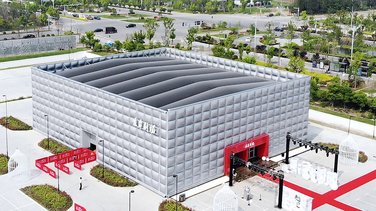 birds eye view of a premium marquee for a Theatre in China in the background parks
