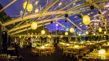 Interior view of a large tent with transparent roof tarpaulin