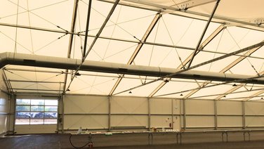 Side view from the inside of a roller shutter door in a warehouse