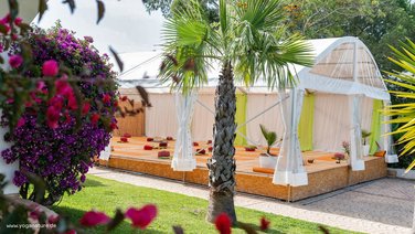 Exterior view of a bodega tent as a yoga room in a yoga resort