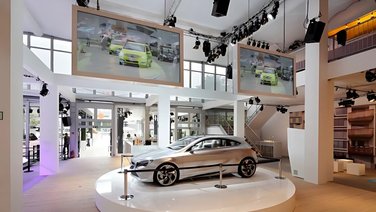 corporate event hall entrance area inside with multimedia monitors