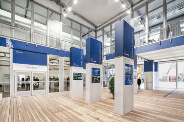 Bauer exhibition hall indoor view of foyer, reception and product presentation