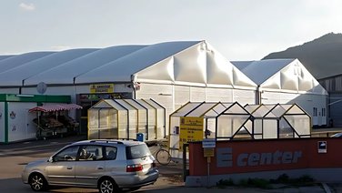 Multi-aisled temporary retail sales area, exterior view