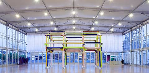 Interior view of the entrance hall of a multi-storey RÖDER tent as a venue for an art exhibition in China