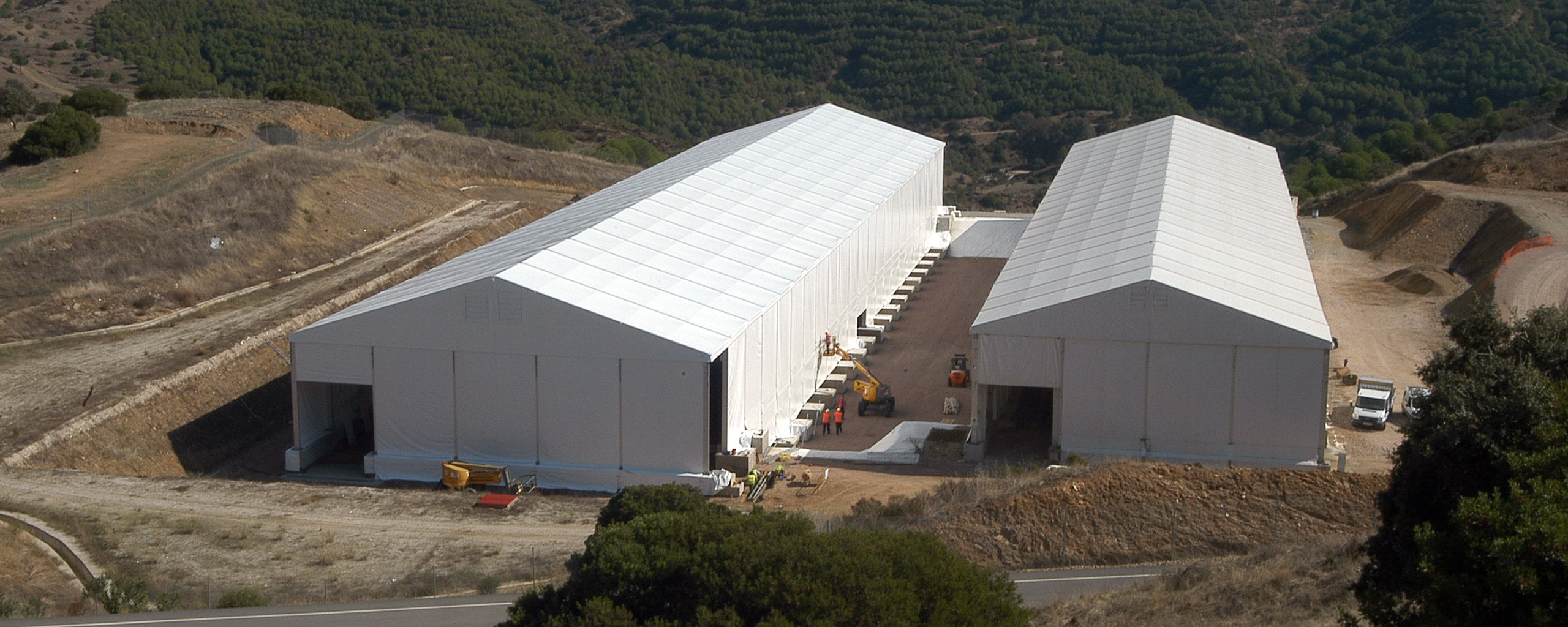 Enresa Waste Storage Halls - birds eye view of two big tents for storage
