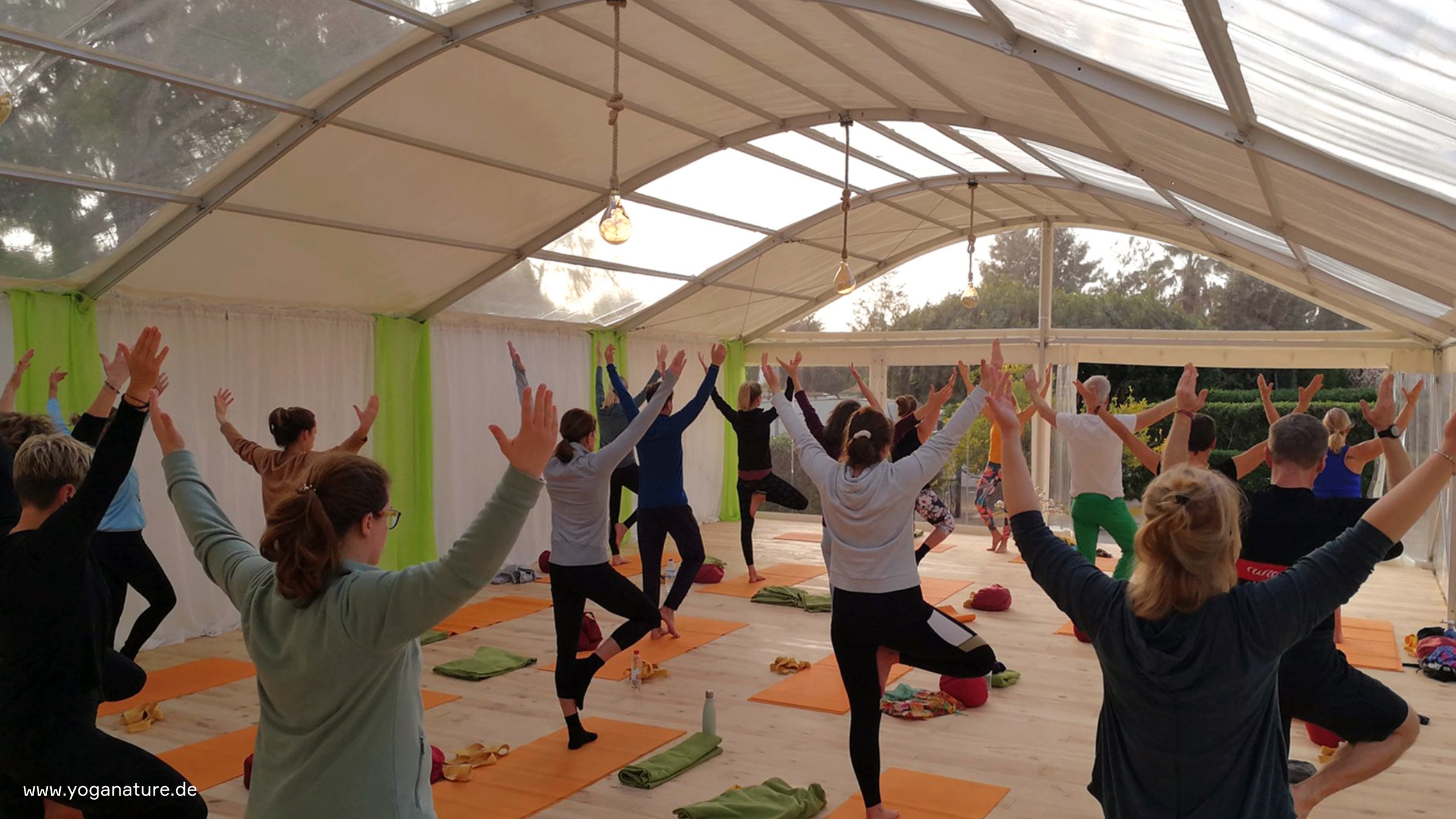 Bodega tent as a yoga room with persons Bodega_-_Yoga_in_Aktion.jpg