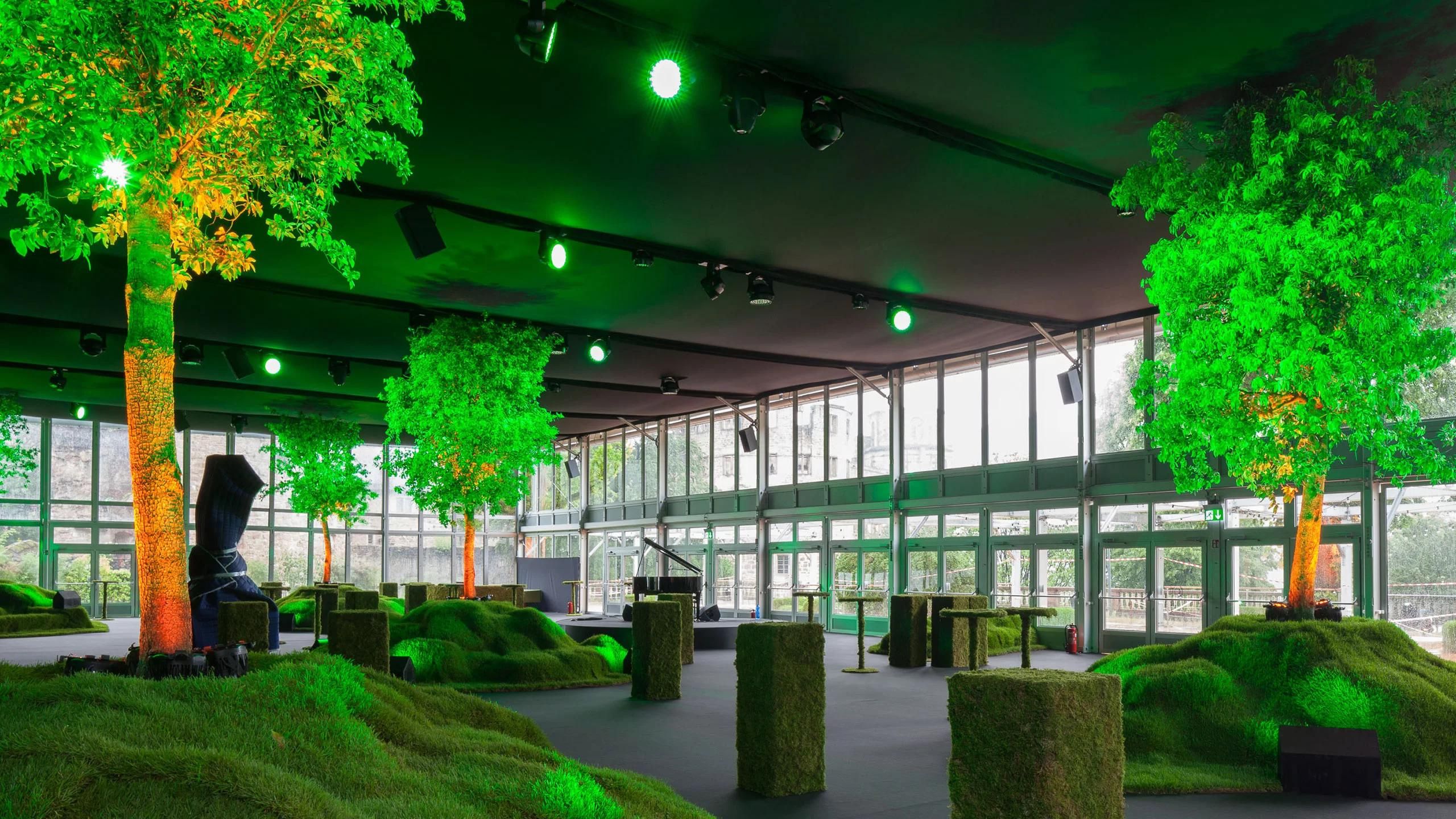 Interior view showroom with green illuminated trees